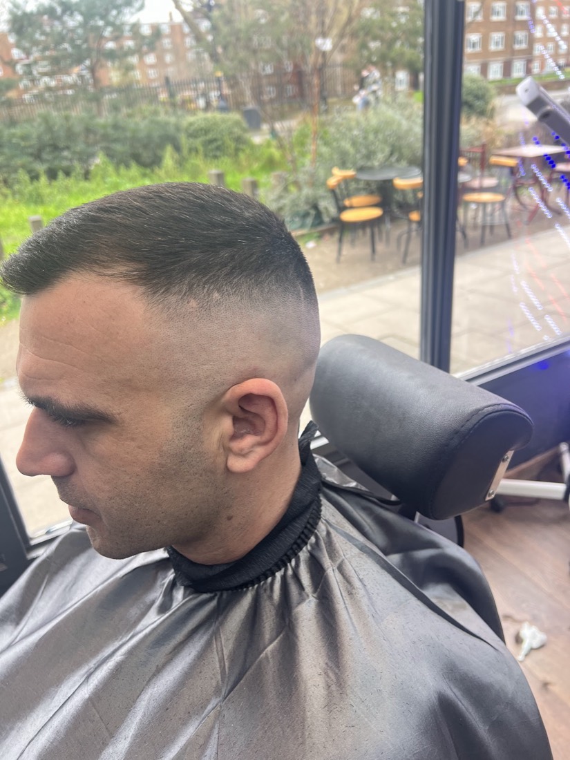 Short crop with a high skin fade, finished at Golden Razor