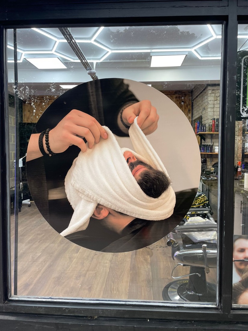 Traditional Turkish hot-towel shave in progress at Golden Razor